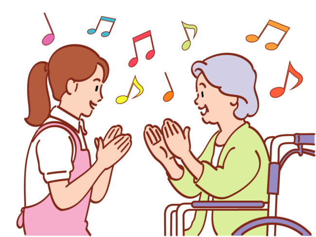 介護施設で施設職員と一緒に音楽を楽しむ社交ダンスレッスンの様子